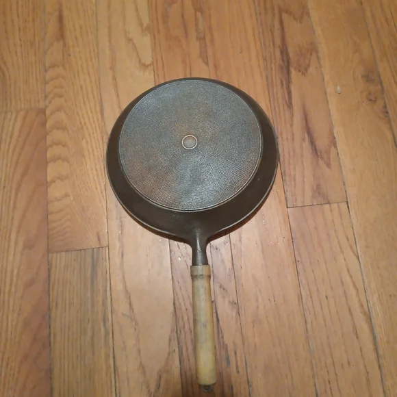 Classic Gray Cast Iron Frying Pan with Wooden Handle